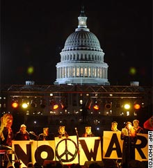 Antiwar protesters rally at the Capitol prior to the State of the Union.